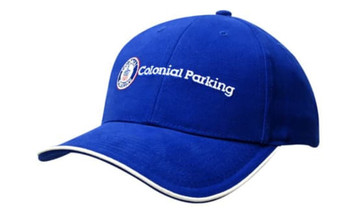 A blue cap with a curved brim and white piping, featuring a logo on the front.