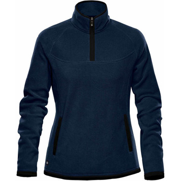 A women's polar fleece jumper in navy with black accents, featuring a 1/4 zip and side pockets. It has a logo.