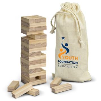 A wooden Mini Tumbling Tower game with stacked blocks and a storage bag featuring a logo.