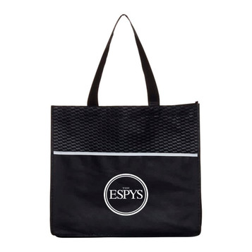 A black shopping tote bag featuring a textured upper and a circular logo at the centre. A black shopping tote bag featuring a textured upper and a circular logo at the centre.