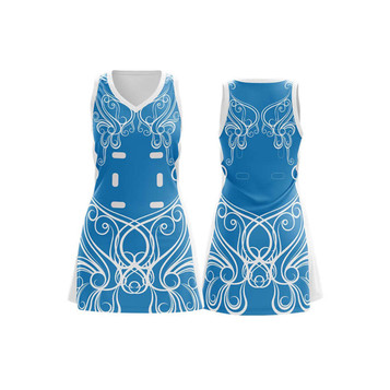A women's A-line netball dress in blue featuring white decorative patterns and a logo. A women's A-line netball dress in blue featuring white decorative patterns and a logo.
