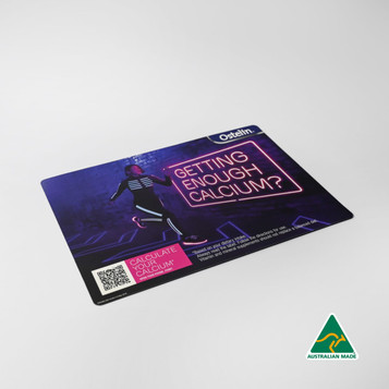 A counter mat featuring a vibrant design with a person and a logo, predominantly in dark colours. A counter mat featuring a vibrant design with a person and a logo, predominantly in dark colours.