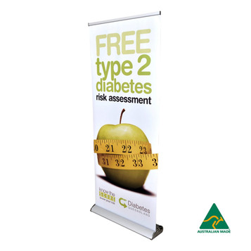A deluxe 850mm roll-up banner featuring a green apple, a measuring tape, and a logo. Predominantly white and yellow. A deluxe 850mm roll-up banner featuring a green apple, a measuring tape, and a logo. Predominantly white and yellow.