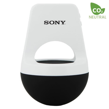 A white and black wireless speaker with a loop handle and logo branding. Compact and modern design. A white and black wireless speaker with a loop handle and logo branding. Compact and modern design.