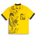 A yellow button-up shirt featuring a black and yellow abstract design on the front and a matching pocket, with a logo.