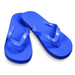 Blue flip flops with a textured sole and glossy straps, featuring a simple design.