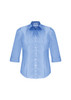 A women's button-up shirt in light blue with 3/4 sleeves and a fitted design, featuring a logo on the label.