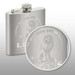 A drink bottle in silver metal with a screw cap and an engraved logo featuring a lion. A drink bottle in silver metal with a screw cap and an engraved logo featuring a lion.