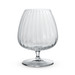 A clear, ribbed cognac glass with a round base, showcasing an elegant design. A clear, ribbed cognac glass with a round base, showcasing an elegant design.