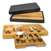 A wooden cheese board in shades of brown, featuring cheese and a set of cheese knives, presented in a black box. A wooden cheese board in shades of brown, featuring cheese and a set of cheese knives, presented in a black box.