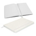 A white Hudson Notebook with lined pages, featuring a cover and a ribbon bookmark.