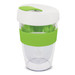 A reusable coffee cup in clear plastic with a white lid and green silicone band. It has a logo on it.