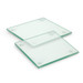 A set of two square glass coasters, featuring a clear finish with rounded corners and rubber feet for grip.