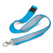 A reflective lanyard in blue and grey with a metal clip for attachment. It features a logo on the strap. A reflective lanyard in blue and grey with a metal clip for attachment. It features a logo on the strap.