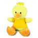 A fluffy yellow duck plush toy wearing a yellow shirt with orange feet and a tuft of hair on its head.