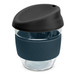 A drink bottle with a dark blue silicone sleeve and a black lid, made of clear borosilicate glass.
