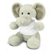 A grey elephant plush toy with large ears, wearing a white shirt, sitting on a flat surface.