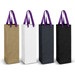 A collection of four paper bags in gold, white, black, and dark green, each with a purple ribbon handle. A collection of four paper bags in gold, white, black, and dark green, each with a purple ribbon handle.