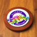 A round wooden coaster featuring a colorful logo with various geometric shapes and the text "Alltech Computers." A round wooden coaster featuring a colorful logo with various geometric shapes and the text "Alltech Computers."
