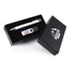 A gift set featuring a silver pen and a black flash drive, presented in a black box with a logo. A gift set featuring a silver pen and a black flash drive, presented in a black box with a logo.