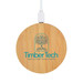 A round bamboo wireless charger with a white cable and a logo on the surface. A round bamboo wireless charger with a white cable and a logo on the surface.