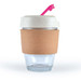 A reusable coffee cup with a cork band, clear base, and a white lid with a pink straw. It has a logo on it. A reusable coffee cup with a cork band, clear base, and a white lid with a pink straw. It has a logo on it.