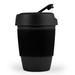 A reusable coffee cup with a silicone band and a secure lid, presented in a sleek black design. A reusable coffee cup with a silicone band and a secure lid, presented in a sleek black design.