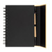 A black spiral-bound notebook with a pen positioned inside. The notebook has a smooth cover and a plain interior.