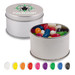 A silver round tin filled with assorted colour mini jelly beans, featuring a variety of bright hues. A silver round tin filled with assorted colour mini jelly beans, featuring a variety of bright hues.