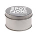 A silver round tin featuring a logo for "Spot On! Cleaning Service." A silver round tin featuring a logo for "Spot On! Cleaning Service."