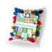 Assorted mini jelly beans in various colors, packaged in a transparent pillow pack with a decorative label. Assorted mini jelly beans in various colors, packaged in a transparent pillow pack with a decorative label.