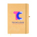 A brown A5 notebook with an elastic band closure and a colorful logo on the cover. A brown A5 notebook with an elastic band closure and a colorful logo on the cover.