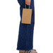 A small brown paper bag held by a person wearing blue jeans and light-coloured shoes. The bag has handles and an embossed logo. A small brown paper bag held by a person wearing blue jeans and light-coloured shoes. The bag has handles and an embossed logo.