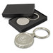 A drink bottle opener key ring in silver, presented in a black box, featuring an engraved logo. A drink bottle opener key ring in silver, presented in a black box, featuring an engraved logo.