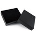 A black gift box with a removable lid, featuring a textured interior and a smooth exterior.