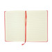 An open Genesis A5 notebook with lined pages and a red cover, featuring a red ribbon marker. An open Genesis A5 notebook with lined pages and a red cover, featuring a red ribbon marker.