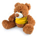 A plush teddy bear with a fluffy texture and a friendly face, wearing a yellow shirt.