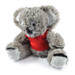 A plush toy koala with gray fur and a red shirt. The toy has a friendly face and plush limbs. A plush toy koala with gray fur and a red shirt. The toy has a friendly face and plush limbs.