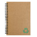 A Stone Paper Notebook with a spiral binding and a recycled material emblem on the cover. A Stone Paper Notebook with a spiral binding and a recycled material emblem on the cover.