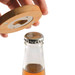 A drink bottle opener coaster made of bamboo, with a circular design and a bottle cap opening mechanism. A drink bottle opener coaster made of bamboo, with a circular design and a bottle cap opening mechanism.