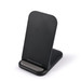 A black wireless charger with a sleek, angled design and a small base for stability. A black wireless charger with a sleek, angled design and a small base for stability.