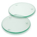 Two round glass coasters featuring a clear design with small grips on the bottom.