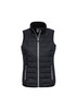 A black women's vest with a zip front, featuring horizontal padding and two side pockets. It has a logo on the chest. A black women's vest with a zip front, featuring horizontal padding and two side pockets. It has a logo on the chest.