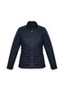 A women's puffer jacket in navy blue with a zip front and side pockets, featuring a logo on the design. A women's puffer jacket in navy blue with a zip front and side pockets, featuring a logo on the design.