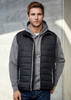 A black men's vest with a quilted design, featuring a zipper and a hood worn over a grey hoodie. A black men's vest with a quilted design, featuring a zipper and a hood worn over a grey hoodie.