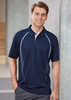 A navy short sleeve polo shirt with light blue accents and a logo. Model is standing with a casual pose.