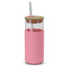A glass tumbler in pink with a bamboo lid and stainless steel straw. It features a silicone sleeve. A glass tumbler in pink with a bamboo lid and stainless steel straw. It features a silicone sleeve.