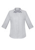 A light grey women's button-up shirt with 3/4 sleeves and a collar. It features a logo on the chest. A light grey women's button-up shirt with 3/4 sleeves and a collar. It features a logo on the chest.