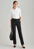 Women's black stretch pants with adjustable waist, paired with a white shirt and black handbag for a polished look. Women's black stretch pants with adjustable waist, paired with a white shirt and black handbag for a polished look.