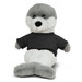 A plush seal toy with grey and white fur wearing a black shirt, featuring a logo on the shirt.